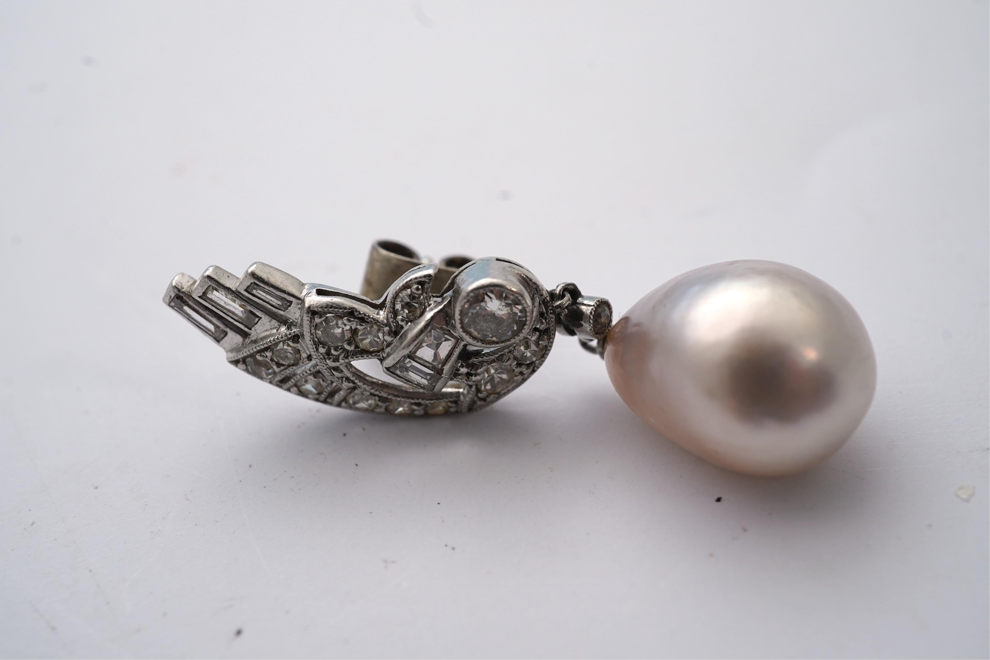A fine pair of Art Deco natural pearl and diamond earrings, 1930s